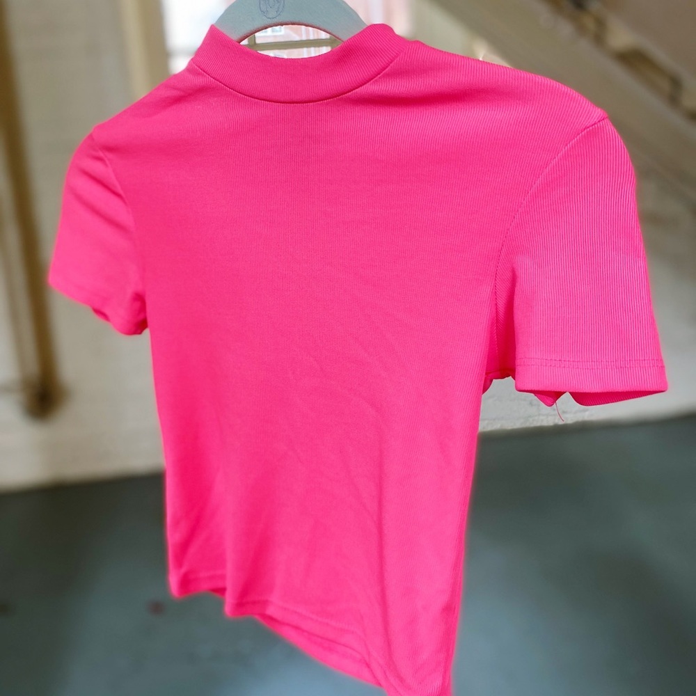 tight neon pink crop top